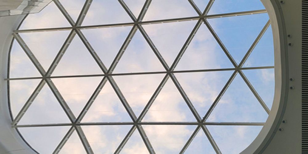 What are the applications of ETFE membrane materials in building curtain walls and walls
