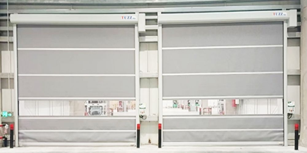 Characteristics and application of PVC soft fast rolling shutter door in workshop passage
