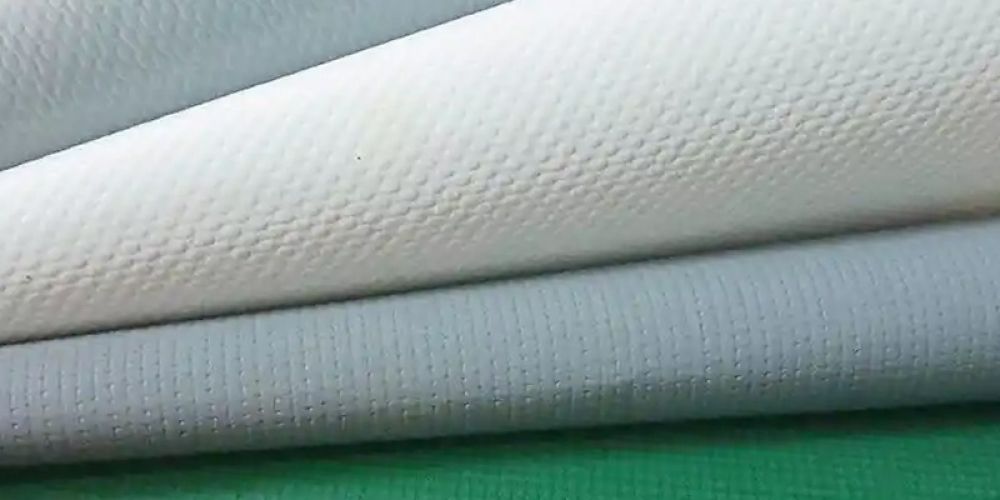 Performance differences between PVDF and PVC membrane fabrics