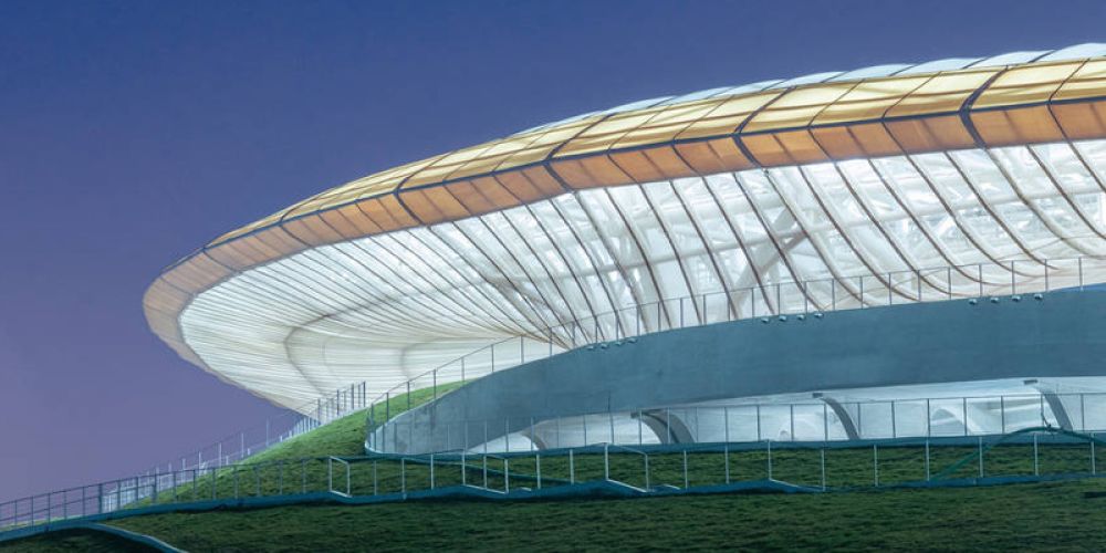 What are the light transmittance rates of PTFE film and PVC film respectively