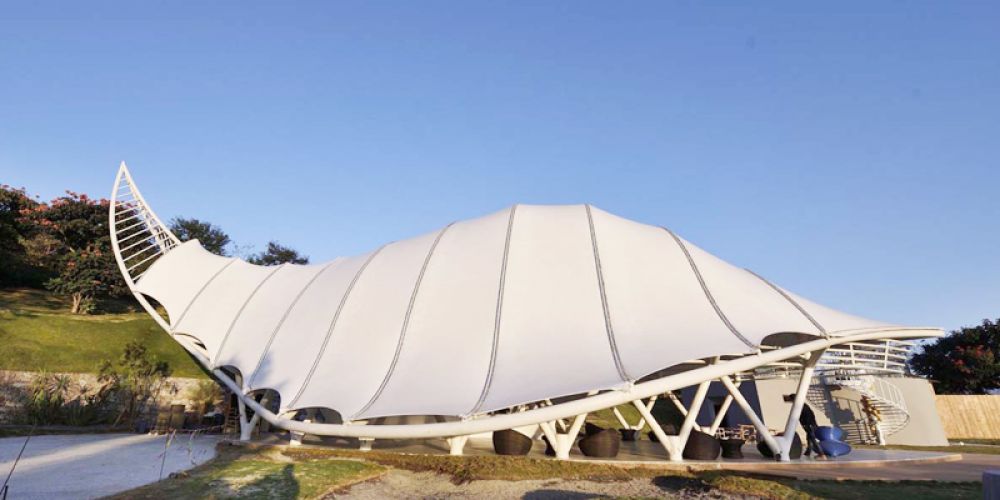 Cases of the application of tensioned membrane structures in architecture